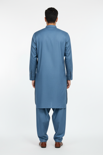 Back view of blue merino wool shalwar kameez on model