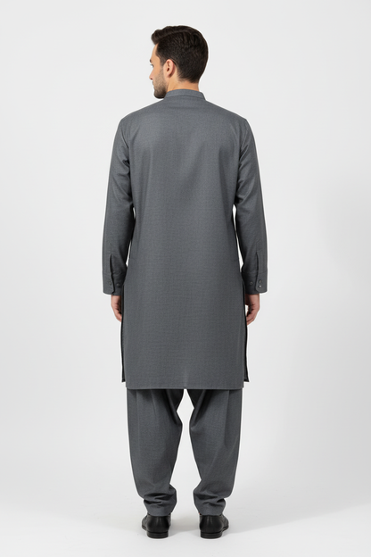 Back view of dark grey merino wool shalwar kameez on model