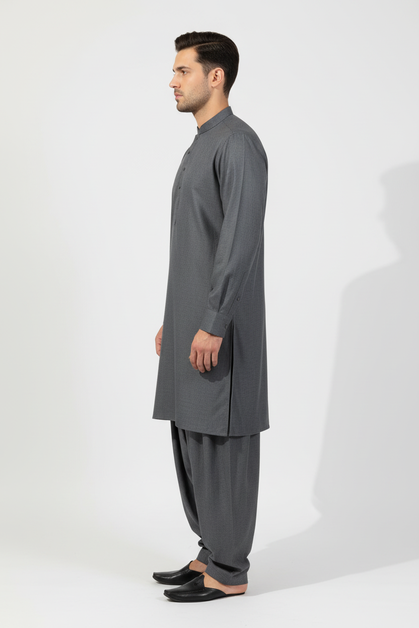 Side view of dark grey merino wool shalwar kameez on model