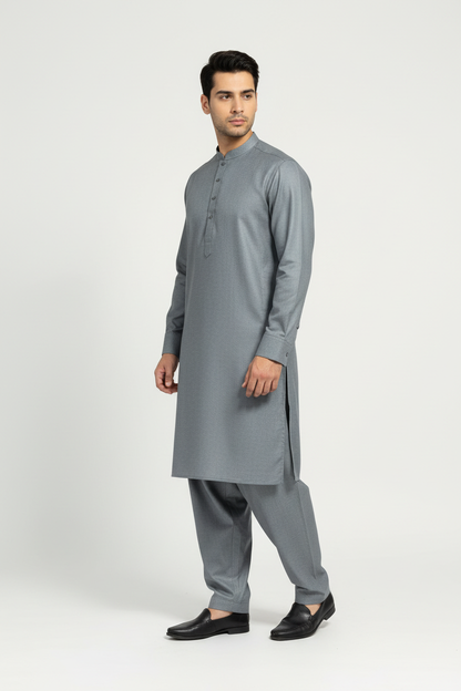Side view of light grey merino wool shalwar kameez on model